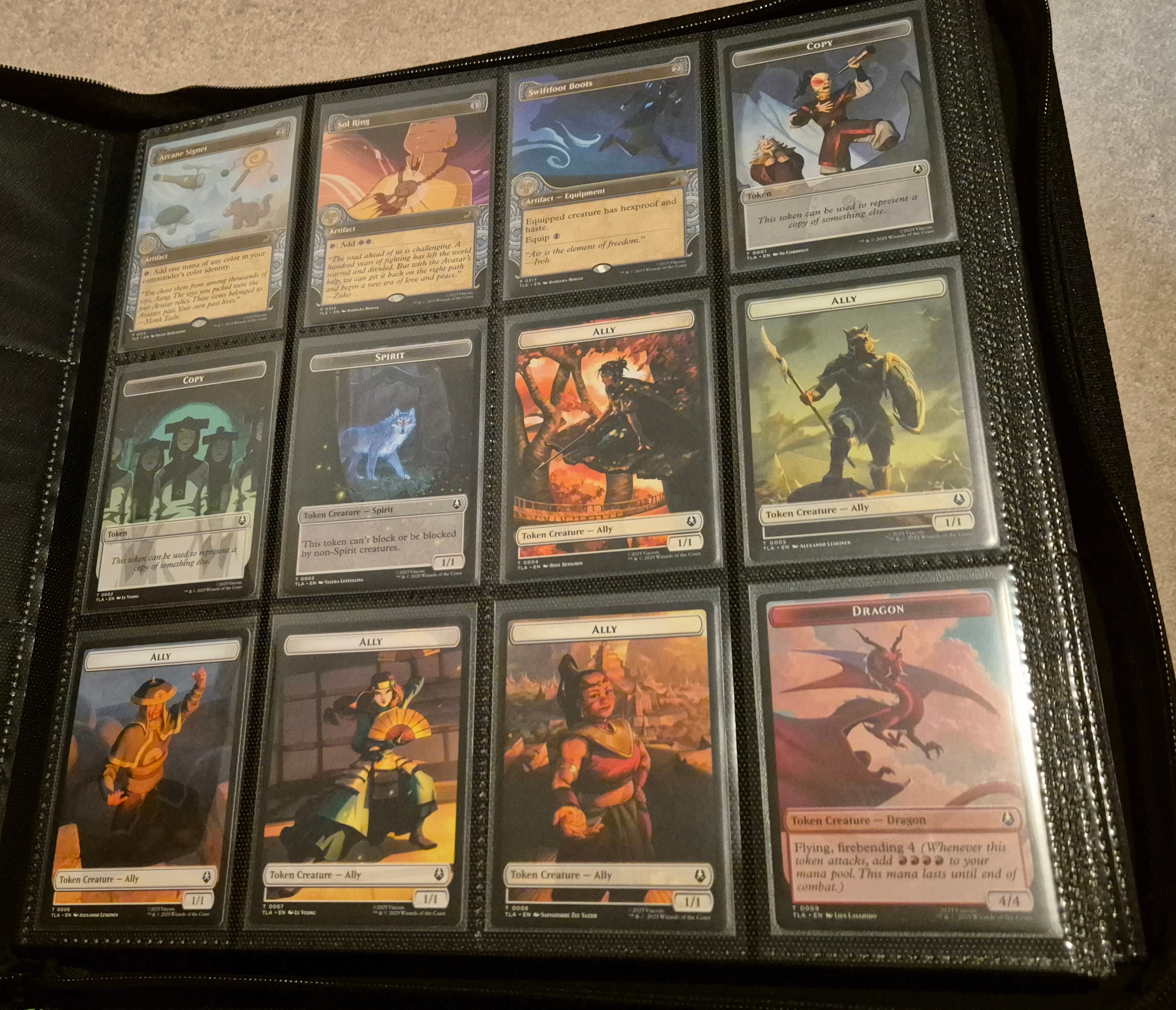 A full binder page of cards