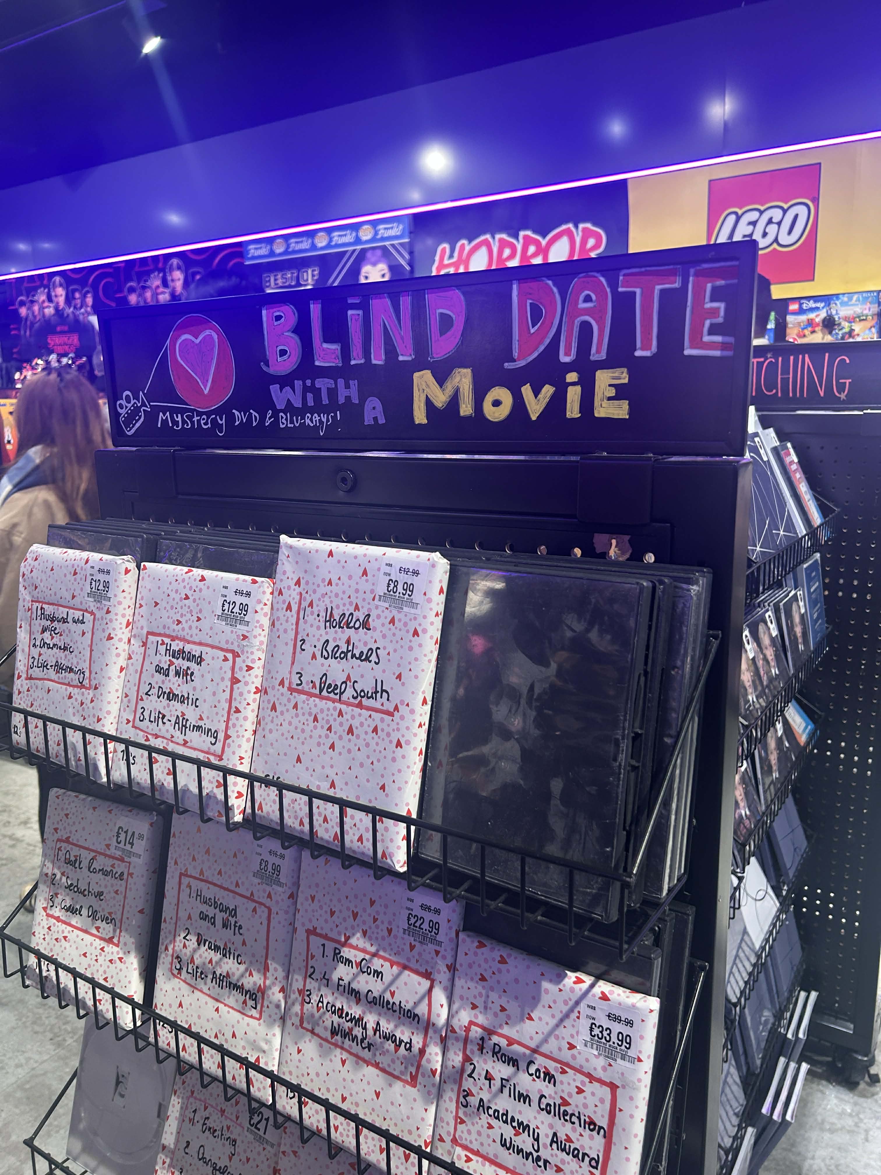 Shelves of wrapped mystery DVDs